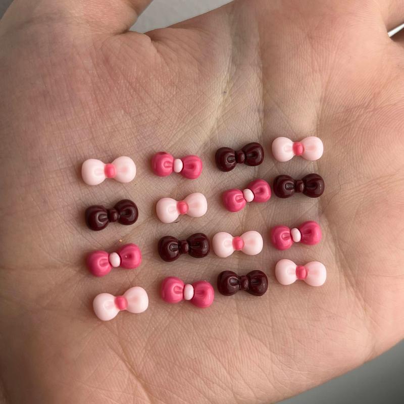 پیکسل ناخن-پاپیون رنگی