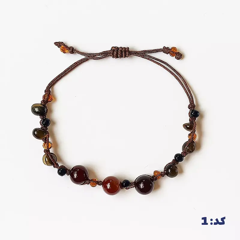 alt="دستبند سنگ پرهنیت با مهره‌های کریستالی"