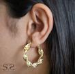 گوشواره زنانه طلا ۱۸ عیار گوشواره حلقه پیچ طلا ورساچه کد s-2095 گالری طلا سیستر