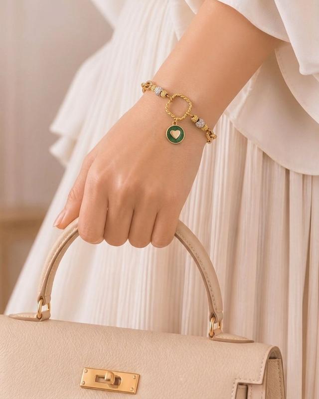 دستبند زنانه طلا ۱۸ عیار دستبند هرمس یا آویز قلب گالری طلای تدریسی