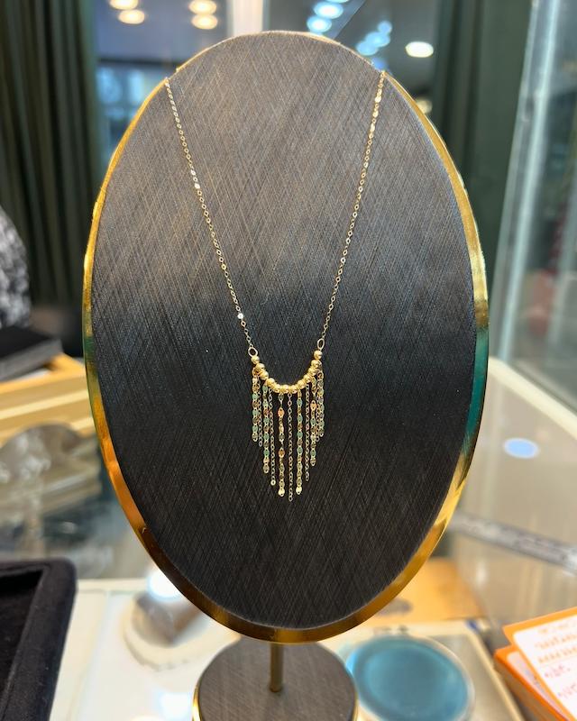 گردنبند زنانه طلا ۱۸ عیار گوی شرابه‌ای گالری طلای ایرانه