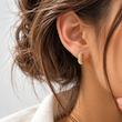 گوشواره طلا ۱۸ عیار گوشواره حلقه ای بافتدار گالری زرنوش