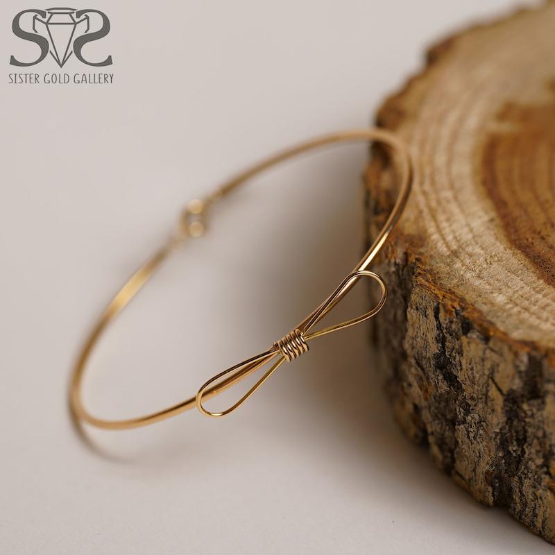 بنگل زنانه طلا ۱۸ عیار دستبند طلا بنگل پاپیون کد s-2836 گالری طلا سیستر