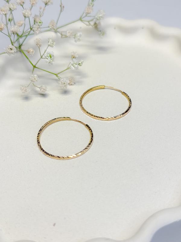 گوشواره زنانه طلا ۱۸ عیار حلقه ای تراش دار غزل گالری