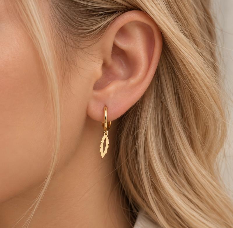 گوشواره زنانه طلا ۱۸ عیار گوشواره حلقه ای طرح برگ سکه طلای میلاد گلد