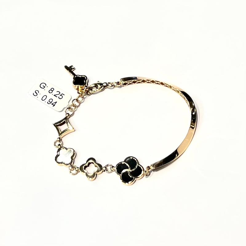 دستبند طلا ۱۸ عیار دستبند نیم بنگل ونکلیف با کسر سنگ سفید مشکی گالری زرنوش