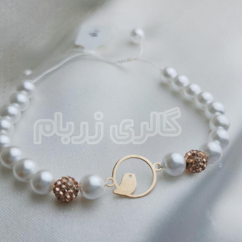 دستبند زنانه طلا ۱۸ عیار مروارید طرح پرنده گالری زربام