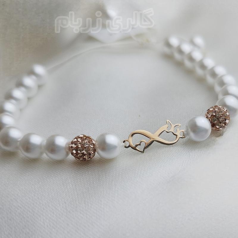 دستبند زنانه طلا ۱۸ عیار مروارید طرح بی نهایت و پروانه گالری زربام