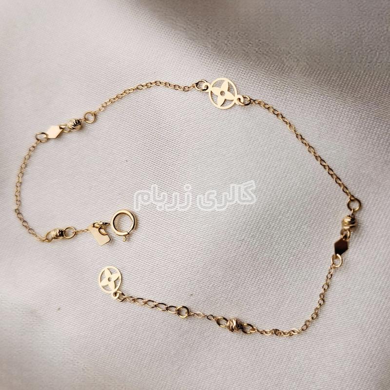 دستبند زنانه طلا ۱۸ عیار زنجیر گل و حلقه گالری زربام