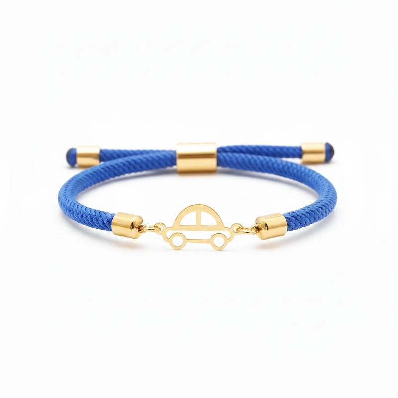 دستبند بچگانه طلا ۱۸ عیار ماشین پسرانه با بند مارشال قابل تنظیم گالری شمش طلا