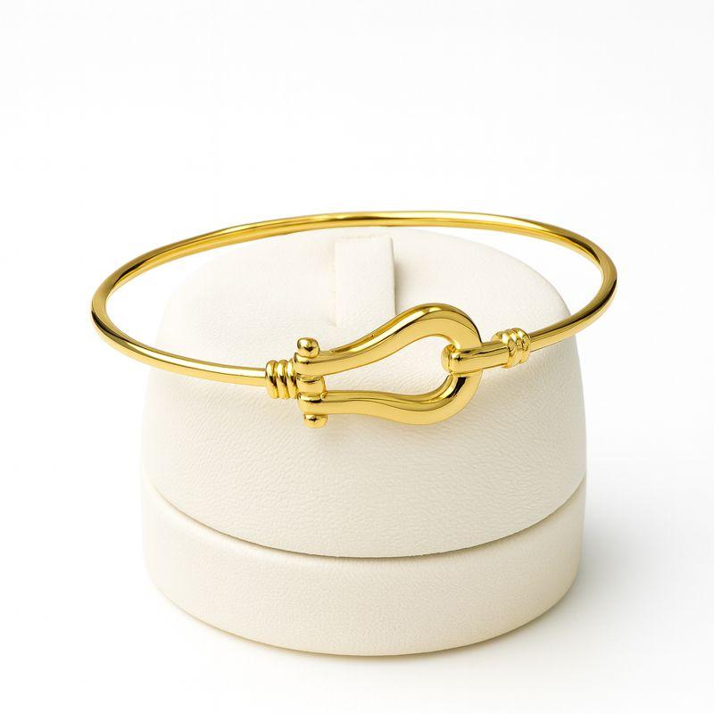 بنگل زنانه طلا ۱۸ عیار بنگل طلا 18 عیار OMEGA گالری مینا‌جان