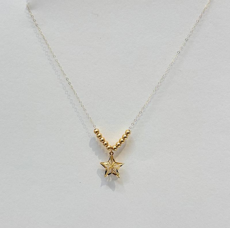 گردنبند زنانه طلا ۱۸ عیار گردنبند گوی و ستاره طلای نیاکی