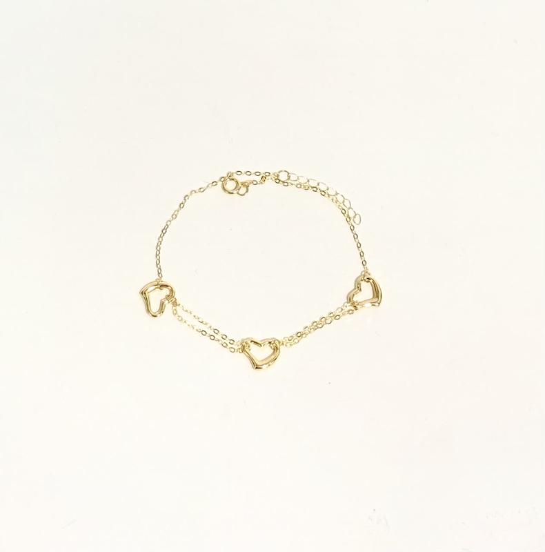 دستبند زنانه طلا ۱۸ عیار دستبند سه قلب دو رج طلای نیاکی