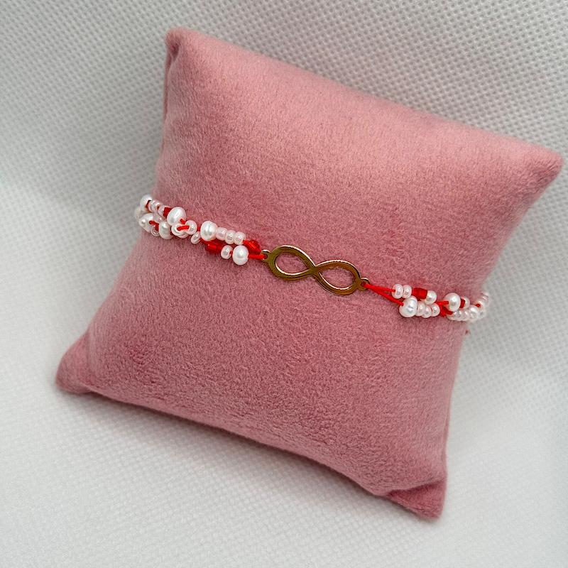 دستبند زنانه طلا ۱۸ عیار دستبند مروارید و طلای  بی نهایت گالری جواهرات نیلوتی