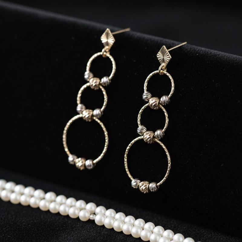 گوشواره زنانه طلا ۱۸ عیار لوزی تراش و گوی گالری شمش طلا