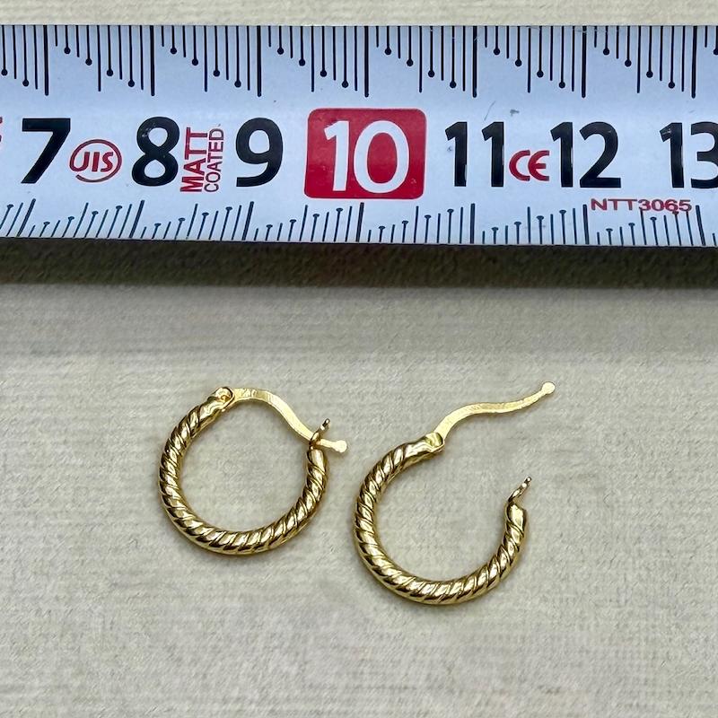 گوشواره زنانه طلا ۱۸ عیار گوشواره حلقه ای پیچی اف گالری