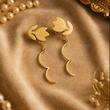 گوشواره طلا 18 عیار زنانه بابل طلا مدل کرلی لاله کد BTE002846