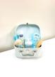 چمدون آبی پاستلی داخل خالخالی آبی