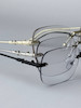 عینک Chrome Hearts Frameless فتوکرومیک با طراحی بدون فریم و بدنه تمام فلز