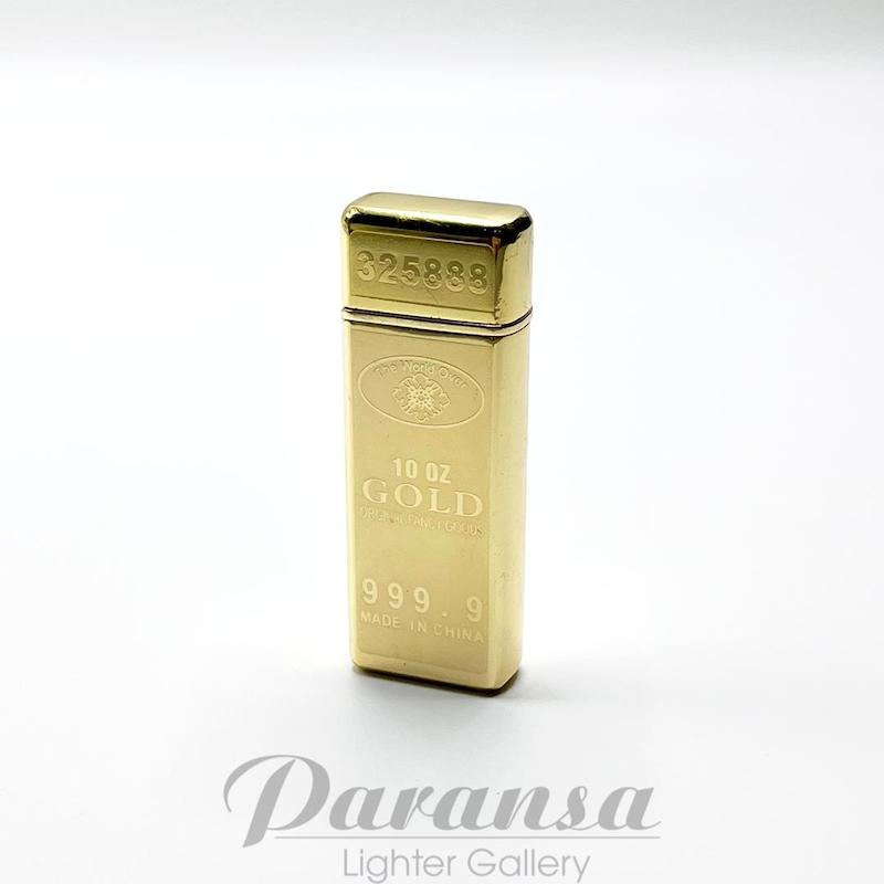 تصویر فندک اتمی طرح شمش طلا گازی با شعله تورچ ضدباد و جعبه شیک