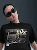 NIKE Solid Women Round Neck Black T-Shirt 