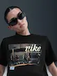 NIKE Solid Women Round Neck Black T-Shirt 