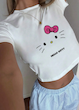 ست تی‌شرت آستین کوتاه و شلوارک طرح هلو کیتی برند SANRIO ( XL تا S) (TAR-19-SHEIN)