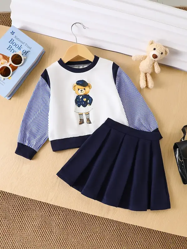 ست دو‌تکه بلوز و دامن دخترانه طرح خرس کارتونی(3 تا 7 سال) (Peg-34-TM)