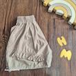 شورتک دخترانه 3-7 سال چین دار کرم کد 13349