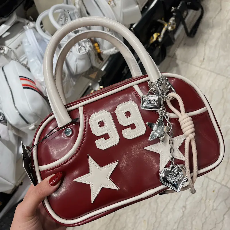 کیف star99 چارم دار