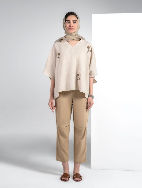 شلوار پارچه ای زنانه هوکانی کد 5017828 کرم تیره