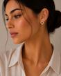 گوشواره استیل طرح گره حلقه‌ای طلایی (بدل)
