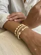 دستبند بدل کشی مهره‌ای کرم/عاجی