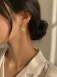گوشواره بدل طرح گل دانه برف (وارداتی)