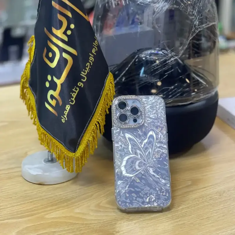 قاب آیفون فانتزی طرح پروانه بی نهایت نگین دار رنگ silver