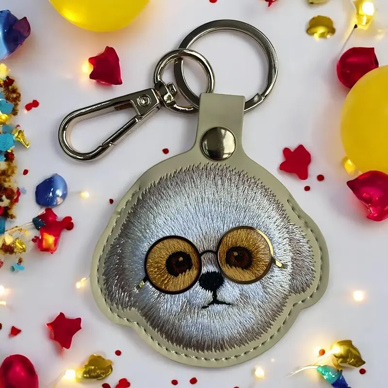 جاکیلیدی Nimmy/جاسوییچی/کیس ایرتگ AirTag Case Nimmy مدل Friends Glasses Cute Pets Embroidery Apple AirTag Case Holder Keychain سگ زرد با عینک