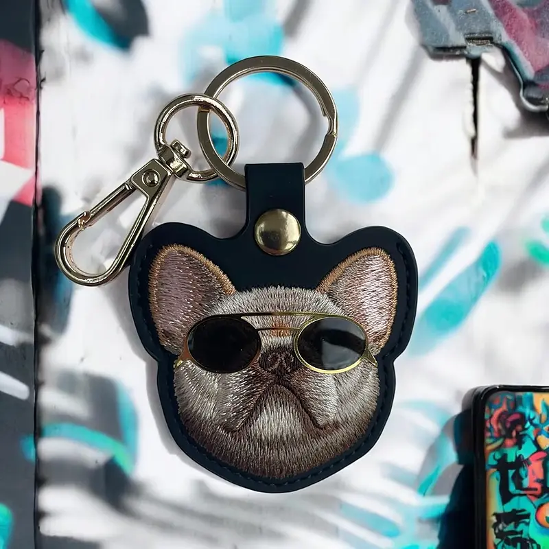 جاکیلیدی Nimmy/جاسوییچی/کیس ایرتگ AirTag Case Nimmy مدل Friends Glasses Cute Pets Embroidery Apple AirTag Case Holder Keychain سگ مشکی با عینک