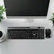 کیبورد و ماوس بی‌سیم تسکو مدل TKM7106W با کلیدهای میانبر مالتی‌مدیا، طراحی ارگونومیک، حسگر 1200DPI، برد 10 متر، سوییچ ممبران و حروف حک شده فارسی مناسب مصارف خانگی و اداری