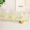 ست شش عددی لیوان شیشه ای شیاردار لیمون کد 2216 روی میز پذیرایی