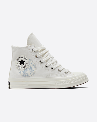 Embroidered cream converse