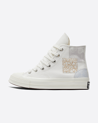 Embroidered cream converse