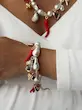 گردنبند و دستبند مرواریدی فلفل 