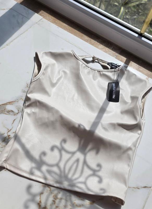 تاپ کرم چرم پشت باز