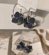گوشواره حلقه ای بزرگ با چارم گل سورمه ای و بنفش