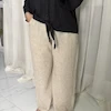 شلوار زنانه کشی پارچه‌ای رنگ کرم | راحتی و خنک | کانگومام