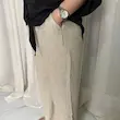 شلوار زنانه کشی پارچه‌ای رنگ کرم | راحتی و خنک | کانگومام