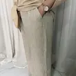 شلوار زنانه کشی پارچه‌ای رنگ کرم | راحتی و خنک | کانگومام