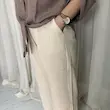 شلوار زنانه کشی پارچه‌ای رنگ شیری | راحتی و خنک | کانگومام