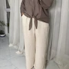 شلوار زنانه کشی پارچه‌ای رنگ شیری | راحتی و خنک | کانگومام