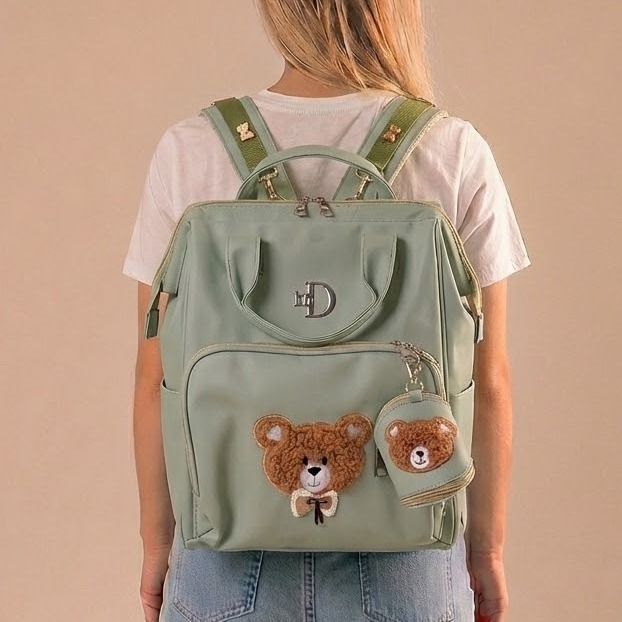 کوله پشتی لوازم نوزاد تدی کانگومام | چرم مصنوعی، ضد تعریق و جاپستونکی دار سبز